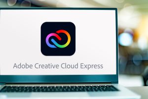 POZNAN, POL - JUN 21, 2022: Laptop computer displaying logo of Adobe Creative Cloud Express, a unified task-based, web and mobile app developed by Adobe Inc